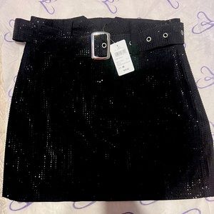 Black bejeweled mini skirt